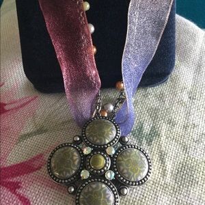 Beautiful Landau pendant and ribbon necklace.